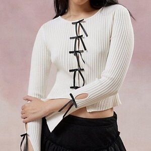 kimchi blue white ribbed cardigan sweater with black bow clasps